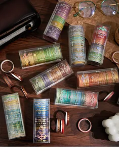 Variety of Aerobic Lifestyle series bronzing washi tape sets on vintage wood
