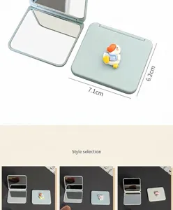 Detail showing dimensions and style variants of the cartoon folding makeup mirror