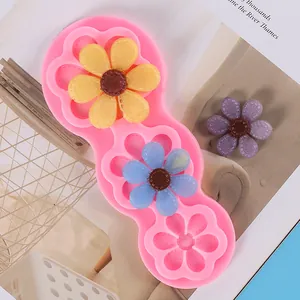 Detailed view of a pink sunflower silicone mold featuring resin DIY flower accessories