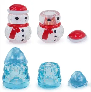 Finished resin Christmas snowman and tree ornaments with glitter details