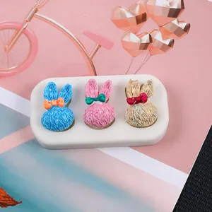 Close-up of DIY rabbit silicone mold showing textured resin animal shapes for handmade crafts
