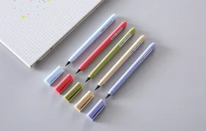 Macro view of five inkless eternal pencils in assorted pastel macaron colors with caps