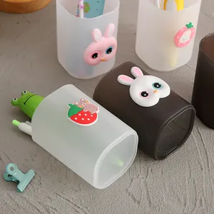Cute cartoon pen holders and desktop organizers for office and student stationery set.
