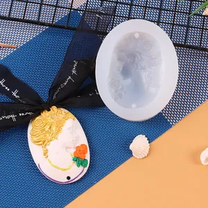 Detail of Cameo woman profile silicone mold for DIY plaster or fondant crafts