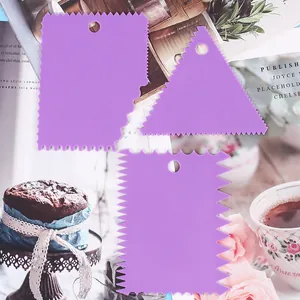 Macro view of 3-piece purple plastic cake scrapers with different jagged edge patterns