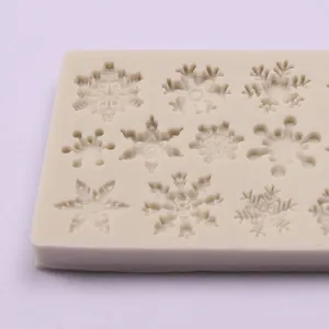 Detail view of snowflake pattern silicone mold for Christmas fondant cake decoration