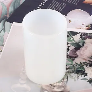 White cylindrical silicone mold detail for DIY resin casting and candle making crafts.
