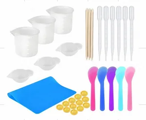 DIY epoxy resin mixing tool set including silicone mat, measuring cups, and pipettes