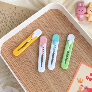 Four cute candy-colored mini utility knives for box opening and students' stationery use