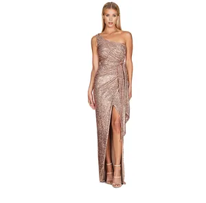 Detailed view of the rose gold one-shoulder sequin gown with high slit and sash