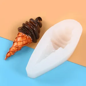 Detail view of white silicone ice cream cone mold with finished chocolate treat