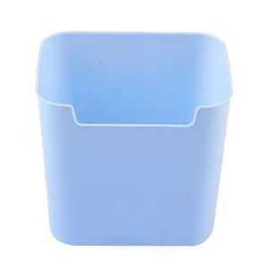 Light blue plastic desktop storage box and pen holder organizer on white background