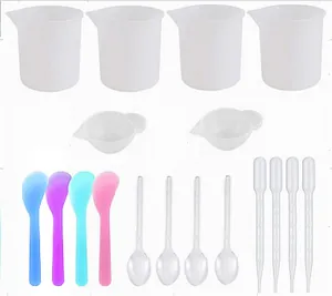 DIY epoxy resin tool kit with silicone measuring cups, stir sticks and droppers