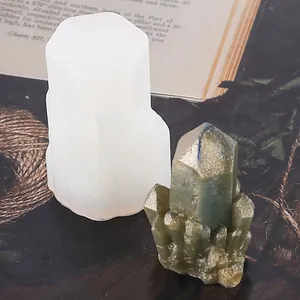 Detailed view of a DIY crystal cluster silicone mold and its finished resin craft piece