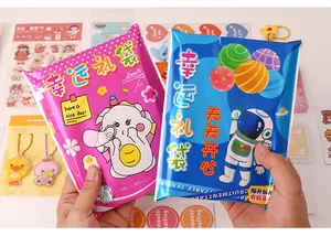 Pochettes surprises créatives de fournitures scolaires avec motifs d'astronaute et licorne