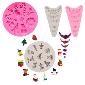 Assorted Christmas silicone molds featuring Santa reindeer and tree shapes for DIY cake crafting