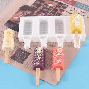 Macro detail of 4-cavity silicone popsicle mold featuring colorful DIY ice cream bars