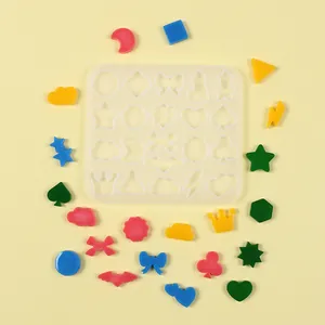 Detail shot of mini geometric silicone mold for DIY earrings and jewelry pendants.
