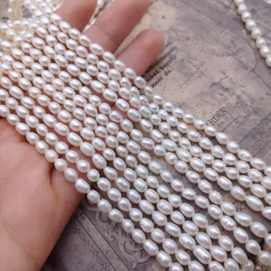 Close-up detail of high-quality rice-shaped freshwater pearl strands for DIY jewelry