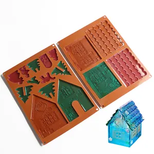 Set di stampi in silicone per casetta di Natale fai-da-te con esempio in resina