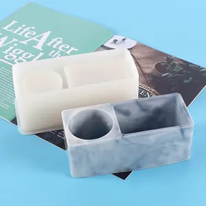 Detail of DIY rectangular silicone mold and marbled resin pen holder storage box