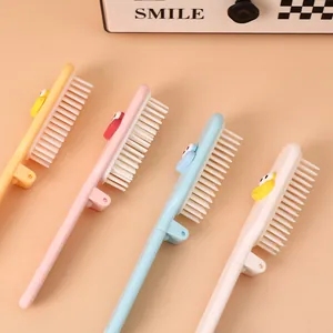 Portable cute cartoon folding mini hairbrushes for travel in assorted pastel colors