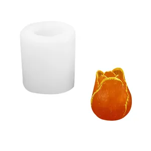 Detail view of tulip flower silicone mold with a finished orange candle for DIY craft