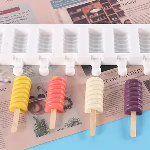 Detail of white 8-cavity silicone popsicle mold with colorful finished ice cream pops