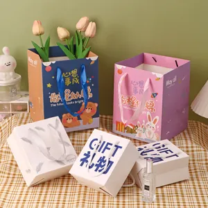 Collection of creative cartoon birthday gift paper bags with handles for party favors