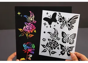 Detail view of a butterfly and rose stencil showing a colorful rainbow painting effect