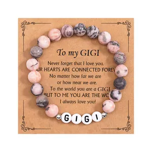 Natural 8mm pink zebra stone beaded bracelet with GIGI alphabet charms on message card
