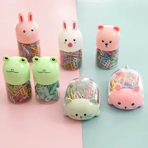 Simpatici contenitori a forma di animale con graffette colorate e mollette per ufficio