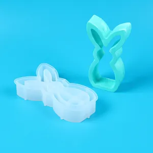 Macro view of bunny shaped silicone mold and mint green finished piece for Easter decor