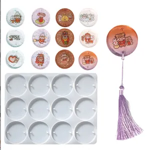 12-cavity circular silicone mold for DIY resin charms with cute cartoon designs and tassel