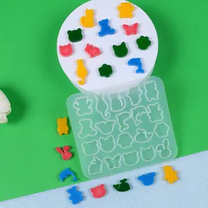 Detail showing multi-shape mini animal silicone mold for DIY resin jewelry making