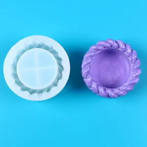Detailed view of DIY silicone mold and finished purple braided succulent flower pot