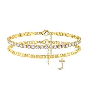 Detailed view of gold-plated double-layered anklet featuring a sparkling 'J' initial