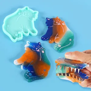 Detail of cat-shaped DIY silicone mold with colorful gradient resin hair clip samples