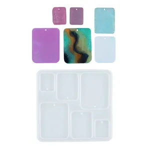 Stampo in silicone traslucido per pendenti in resina e gioielli finiti colorati