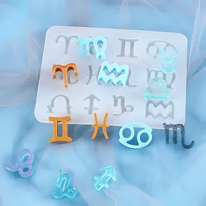 Silicone mold for DIY 12 zodiac signs resin pendants shown with finished pieces
