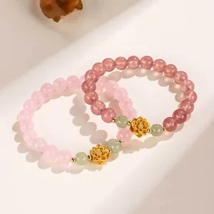 Lotus flower charm bracelet with strawberry quartz and rose quartz beads for women