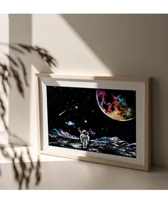 Eingerahmtes Astronauten-Kratzbild mit buntem Planeten und einer Weltraumszene