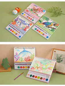 Top and bottom view of watercolor painting books with integrated palettes and brushes