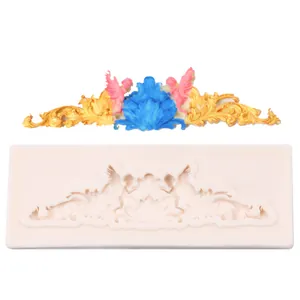 Detail of a vintage Baroque angel relief silicone mold for cake borders and baking decorations.