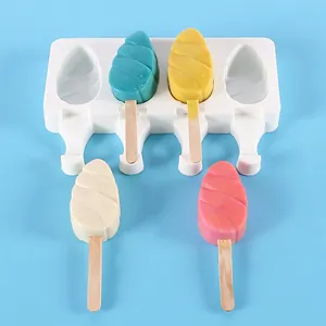 Detail view of a 4-cavity white silicone popsicle mold with colorful ice cream