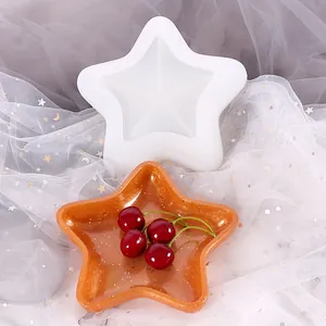 Stampo in silicone a stella bianca e vassoio finito in resina arancione glitter