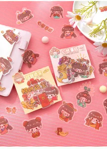 Gros plan d'autocollants PET de filles de dessin animé pour scrapbooking et DIY.