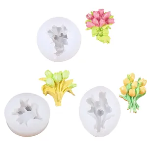 Detailed view of floral silicone molds showing white molds and colorful resin flower crafts