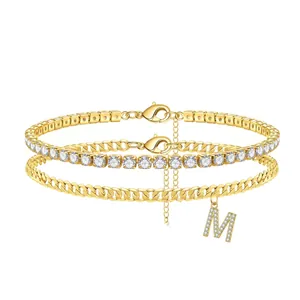 Elegant double layer gold-tone anklet with sparkling tennis chain and M initial charm