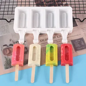 Silicone ice pop mold shown with four colorful homemade popsicles on wooden sticks